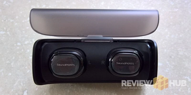 Q29 Earbuds Inside of Case